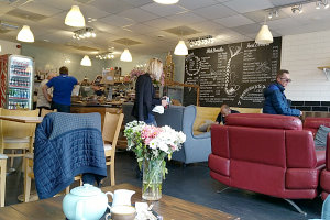 Bild: In einem gemütlichen Café Bild: In einem gemütlichen Café